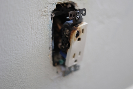 burnt out electrical outlet